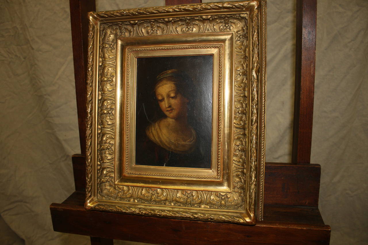 Charming 18th century French portrait painted on cardboard with a gorgeous gilt frame. Provenance: Paris, France.