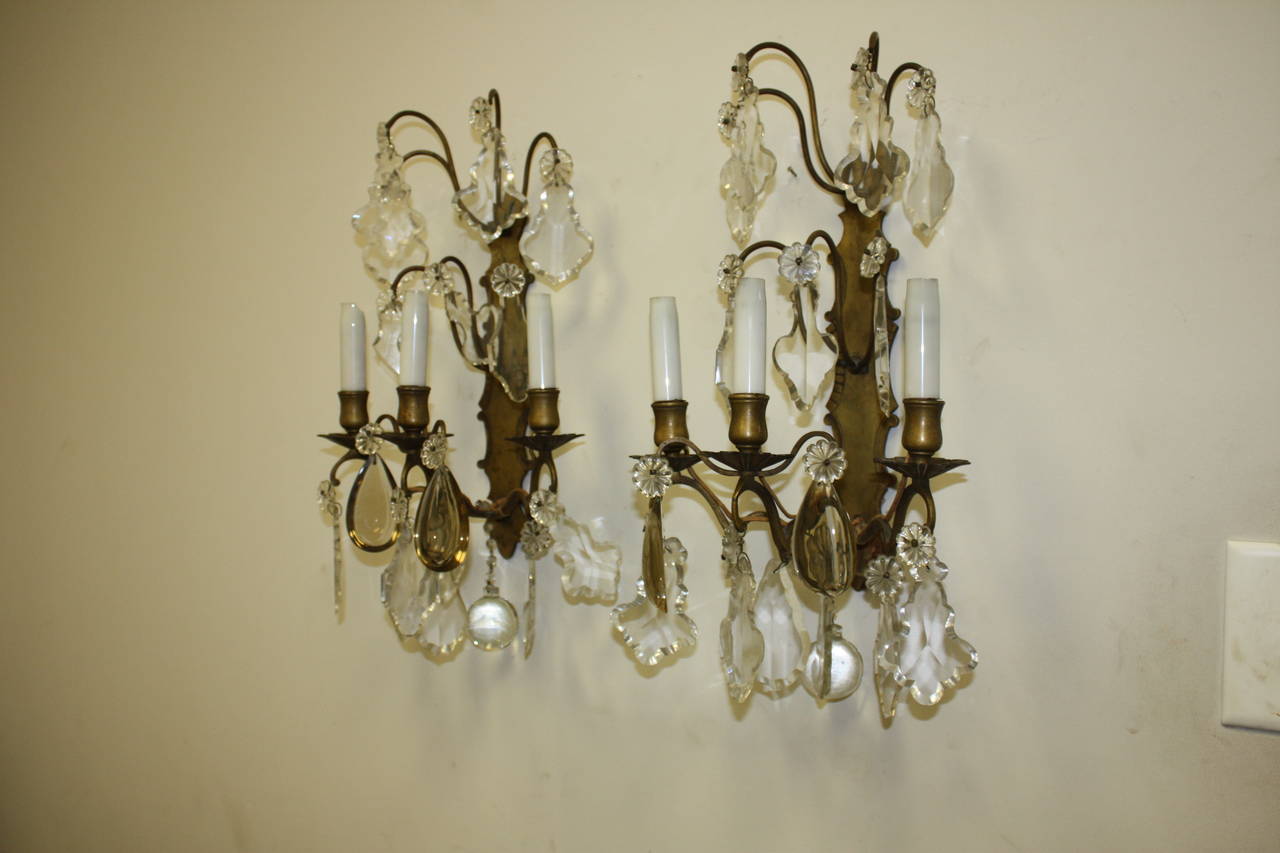 Pair of French, bronze sconces with tassels, French Louis XV style. Provenance: Paris, France.