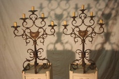 Coppia di candelabri in ferro francesi del XIX secolo
