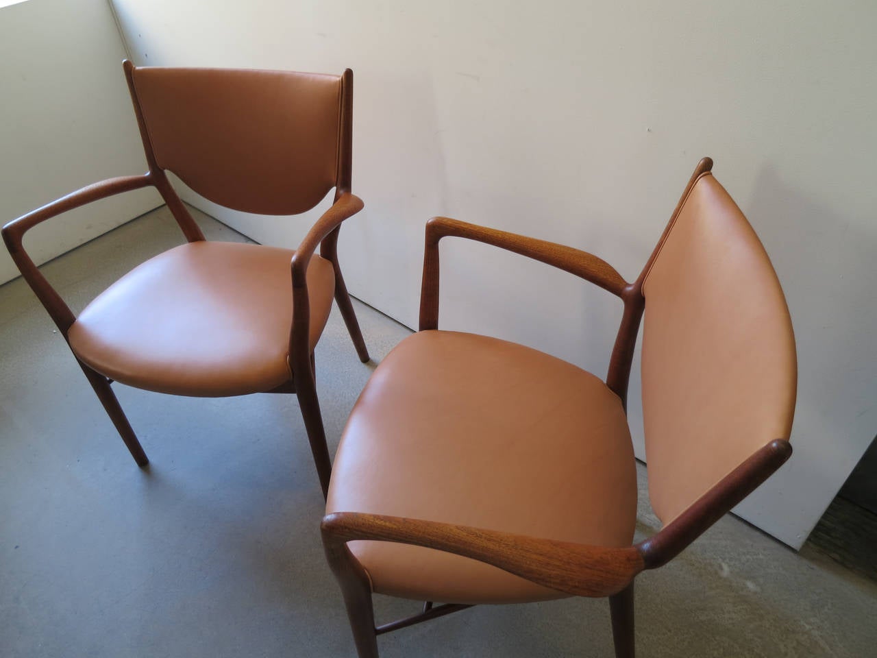 Pair of NV46 Chairs by Finn Juhl in Teak with Natural Leather Upholstery