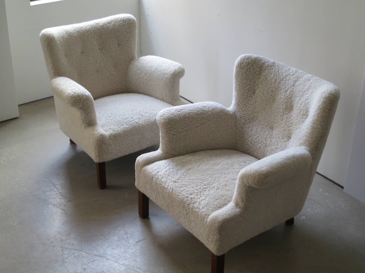 Scandinavian Modern Pair of Elegant and Refined Sheepskin Lounge Chairs by Orla Mølgaard-Nielsen