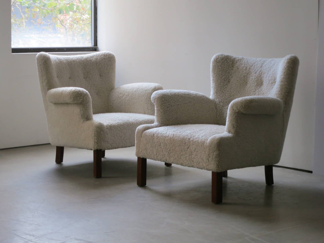 Danish Pair of Elegant and Refined Sheepskin Lounge Chairs by Orla Mølgaard-Nielsen