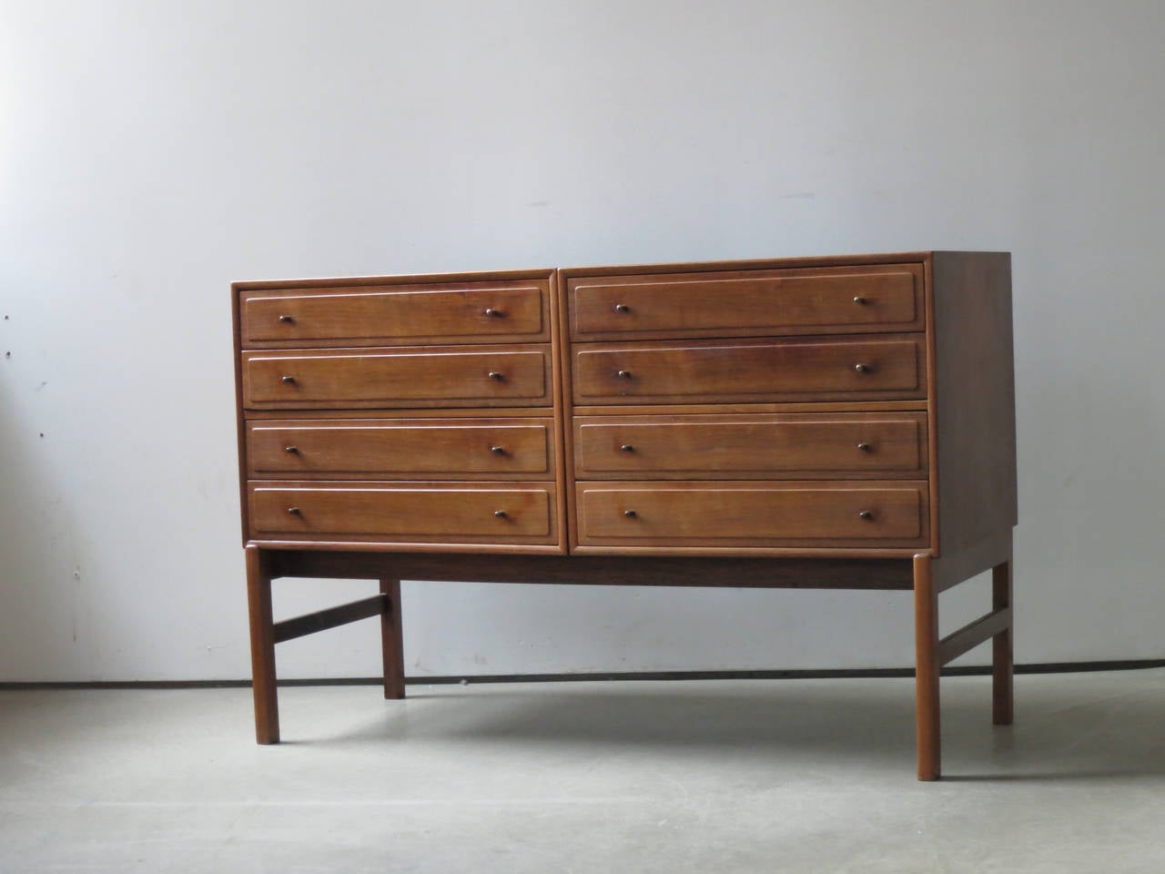 Beautifully Proportioned Rosewood Cabinet in Two Sections by Ole Wanscher. “Addition Cabinet” in two sections, each with four drawers, mounted on a loose frame.

Cabinetmaker A.J. Iversen.

Designed 1959.

Literature:
Ole Wanscher, 
