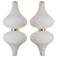 Pair of pendant lights by Stilnovo in white glass and brass