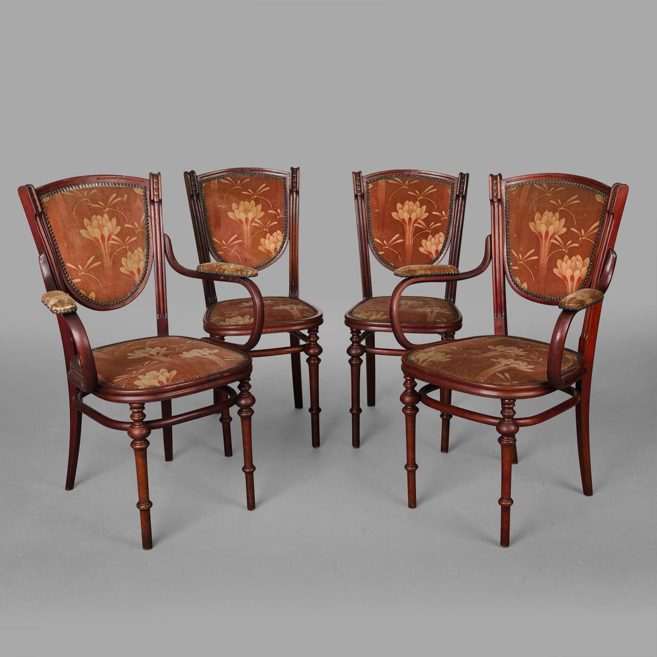 Set composed of two chairs and two armchairs in  bentwood, mahogany tainted beech. Original velvet tapestry, decorated with flowers and dragonflies in beautiful condition excepted the pronounced wear on the armrests.
 
Label under the seat of each