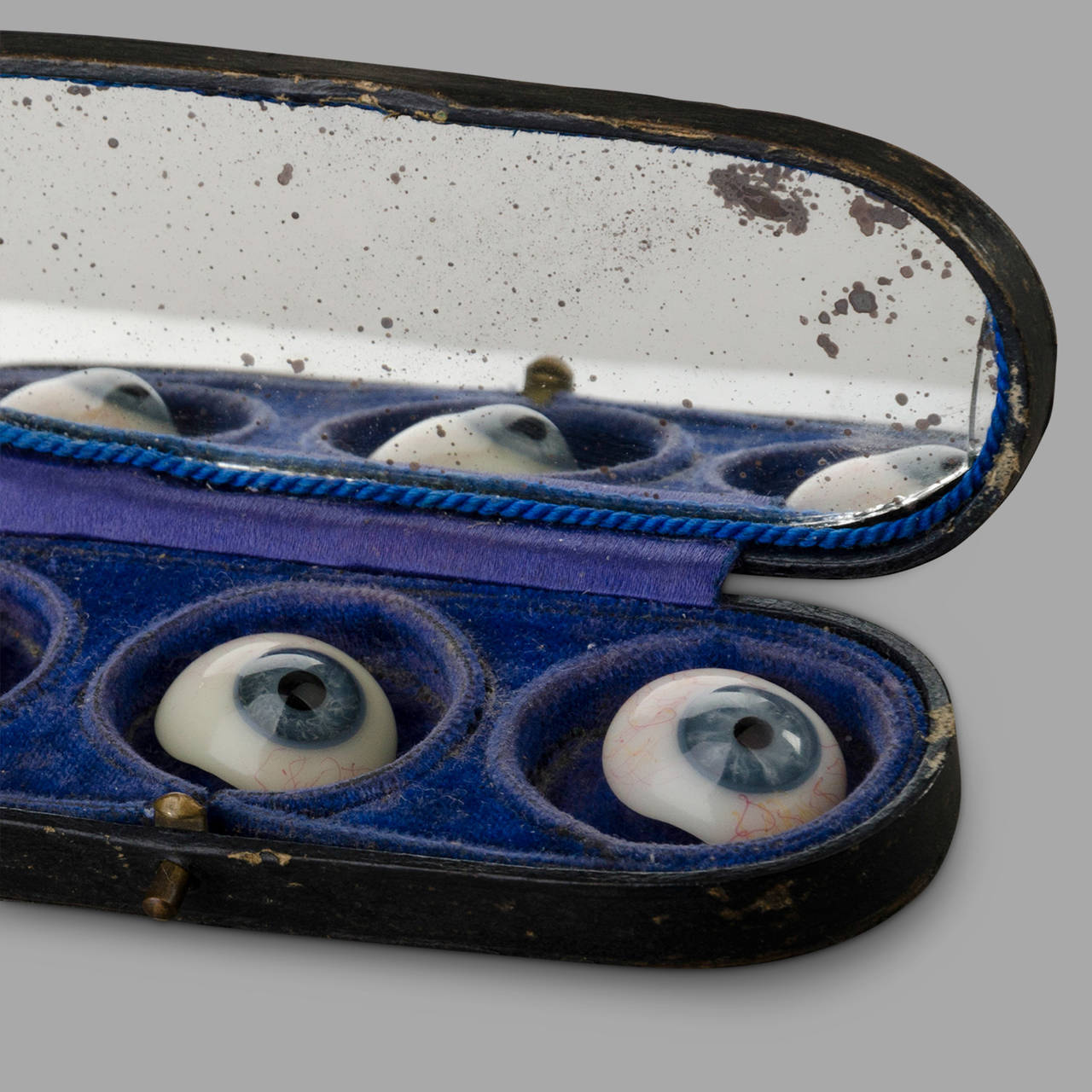 Three Glass Eyes in their Storage Box 1