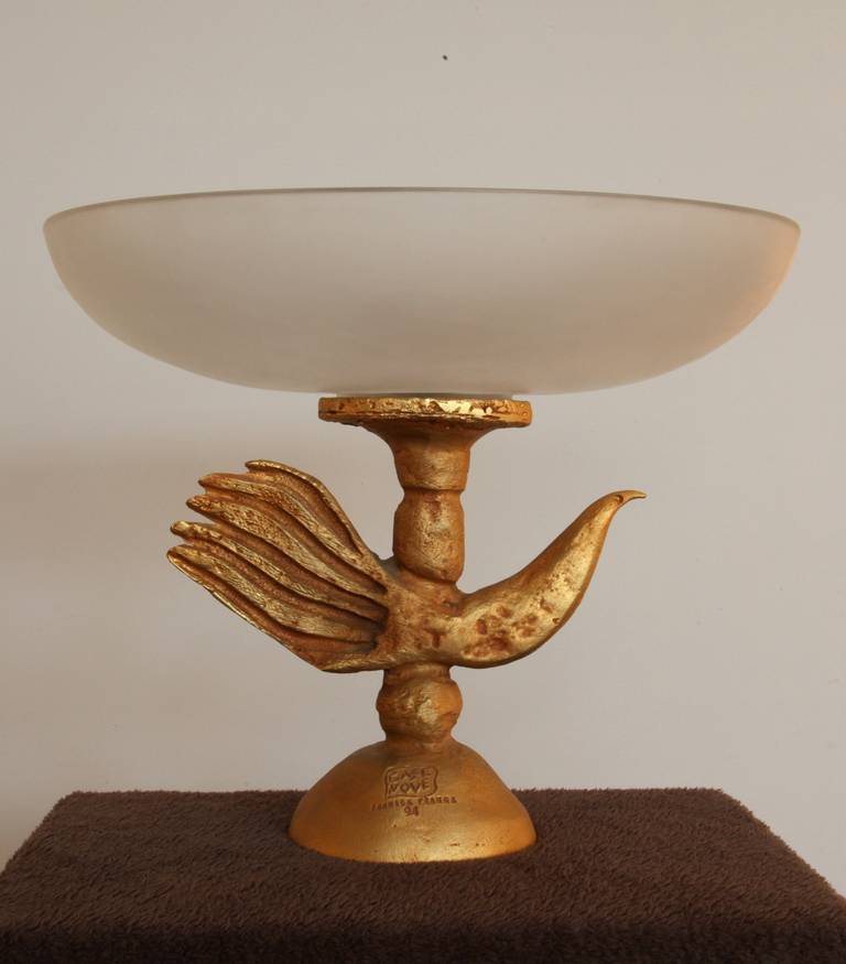 A gilt bronze centerpiece with frosted crystal bowl by French designer or sculptor,
Pierre Casenove ( born 1943).
Signed Casenove Fondica France and dated 1994 and signed again in the heart of the crystal bowl.