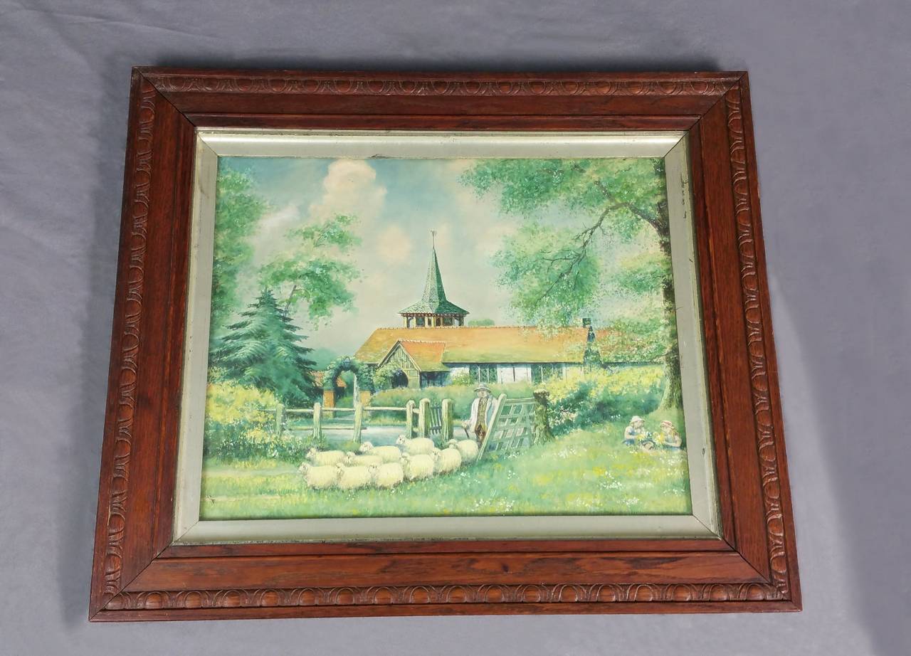 This enchanting 19th century English Nai¨ve school watercolor depicts a farmer with his sheep at a gate, with 2 young girls in a flower meadow alongside him, together in a carved oak frame. The picture measures: 27 in, 68.5 cm wide by 22 ¾ in, 57.8