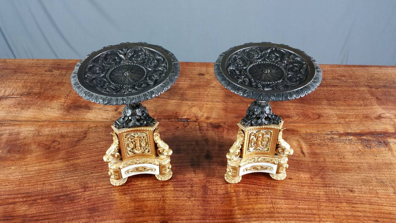 This elegant pair of 19th century Tazzas features a bronze top plate supported by very ornate ormolu and marble tri form shaped base. They measure 9 ½ in – 24 cm in height with a diameter of 6 ½ in – 16.5 cm.