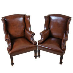 Pair of Leather Wing Armchairs