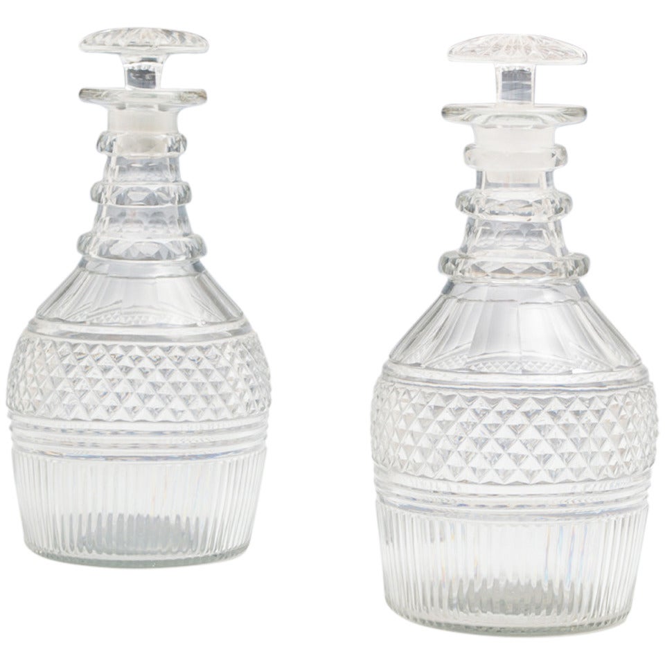 Pair of Diamond and Flute Cut Regency Decanters