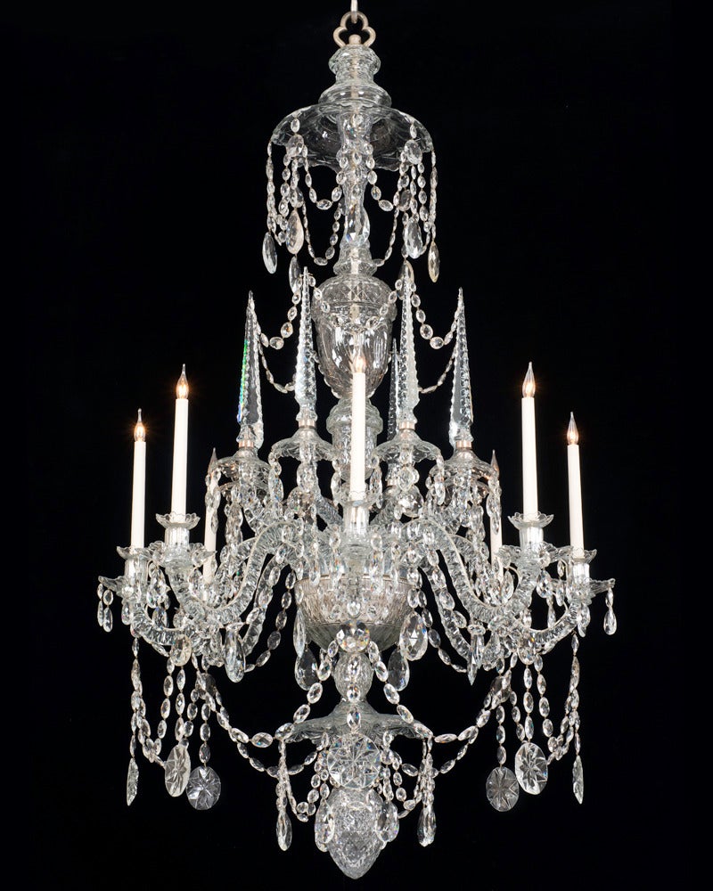 An highly important continental cut-glass eight-light chandelier of the finest quality the multi-baluster shaft centered by a one piece urn this supporting a drop hung canopy terminating with a baluster shaped shaft piece the main receiver plate