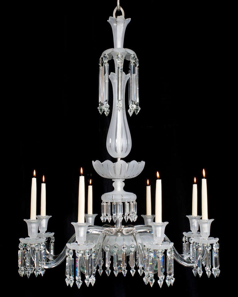 A fine quality mid-Victorian eight-light frosted glass chandelier. The main baluster stem formed as a fountain, the drop hung flute decorated receiver bowl supported by a lapidary cut finial, the arm plate surmounted with eight plain pipe arms. Drop