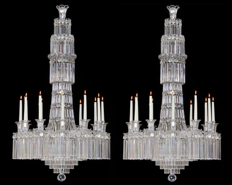 A fine quality pair of Victorian twelve light cut glass and silvered mounted chandeliers of classic tent and waterfall design the main stem consisting of a rule drop tent and three drop hung canopy’s terminating with trumpet shaped top piece. The