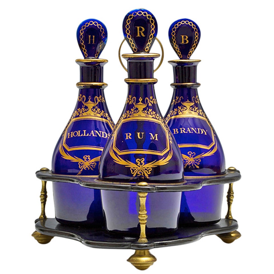 Set of Three Plain Blue, Georgian Decanters with Gilded Labels and Stoppers