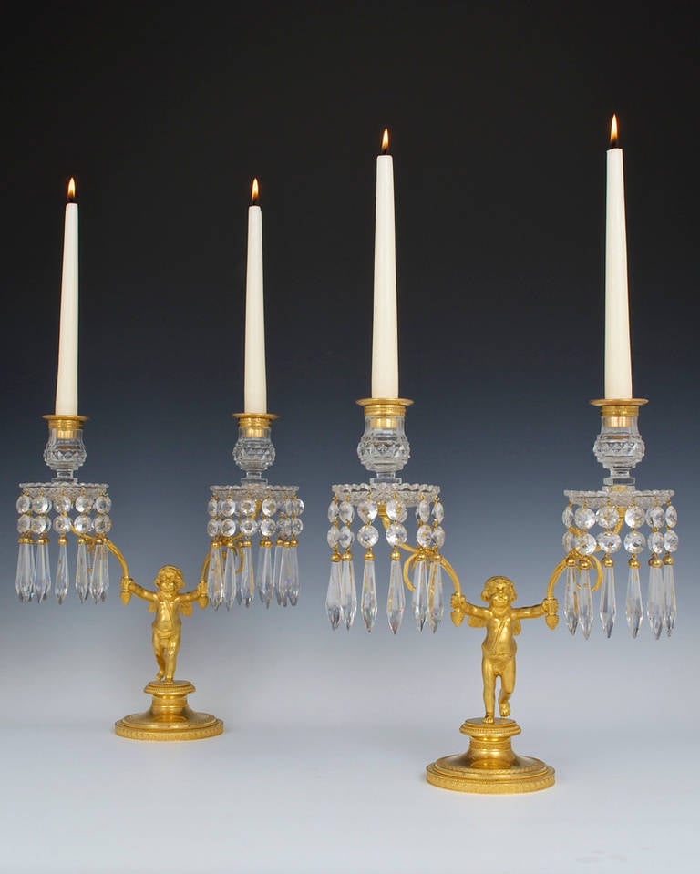 Eccezionale coppia di candelabri a cherubino del periodo Regency inglese