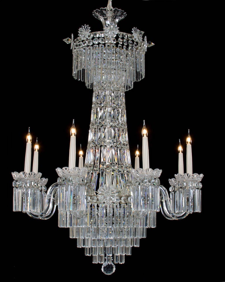 A fine quality early Victorian eight-light cut-glass and silvered mounted chandelier of Classic tent and waterfall design the stem consisting of chains of buckle tent pieces and spangles above which there are two drop hung rings the outer ring with
