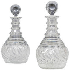 Pair of Swirled Pillar and Step Cut Regency Decanters