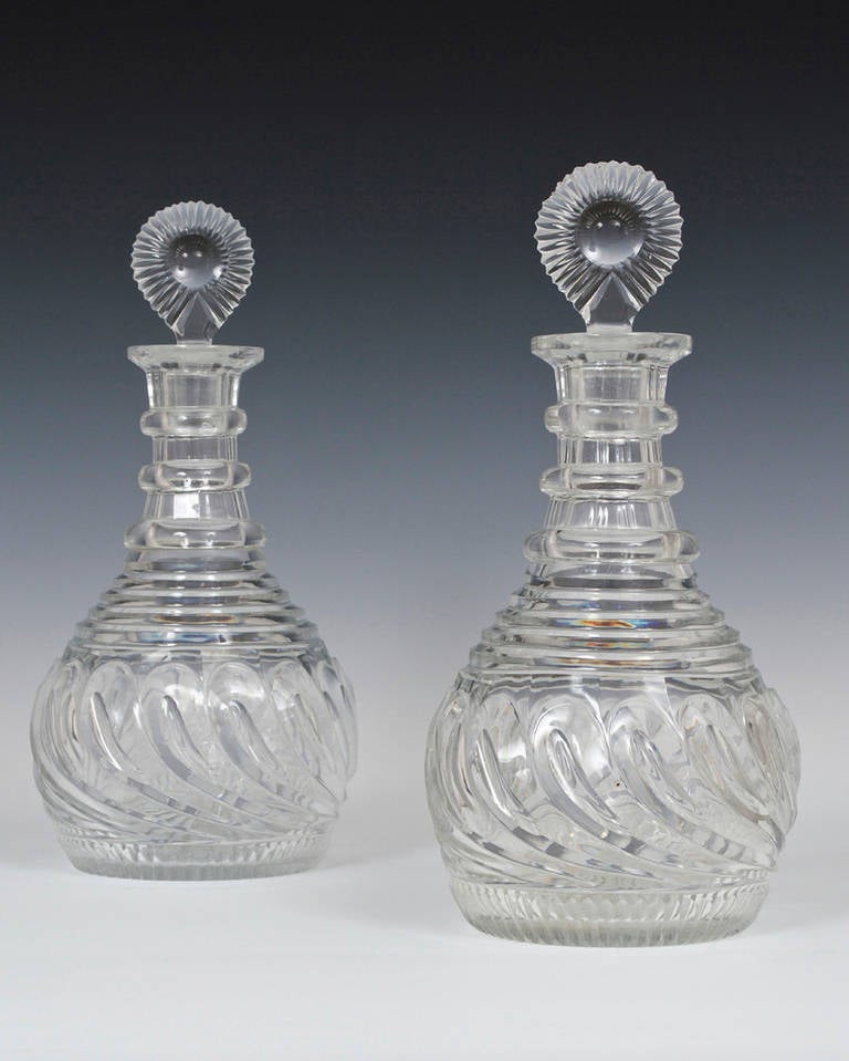 Pair of Swirled Pillar and Step Cut Regency Decanters