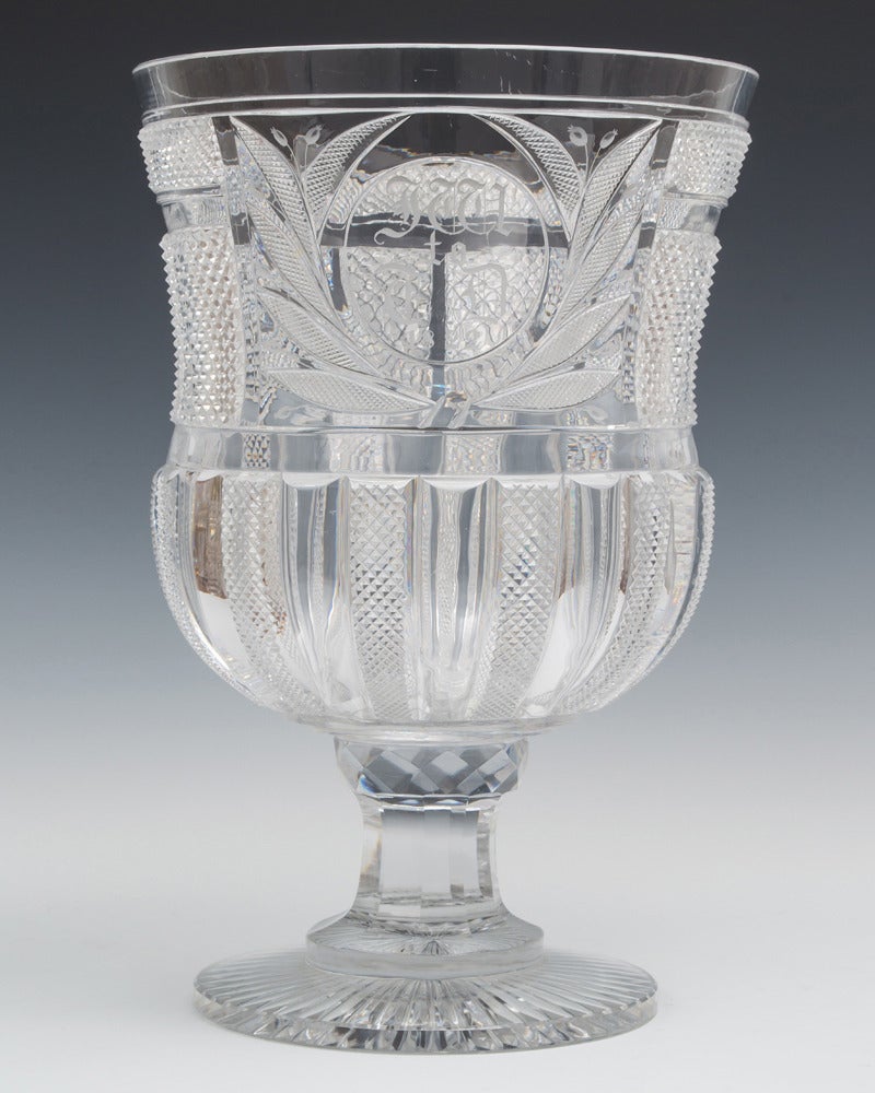 The Goblet is cut with the finest pillar and file cutting and panels of diamonds with a leaf cut panel and engraved initials J.W to T.D, dated 1822.