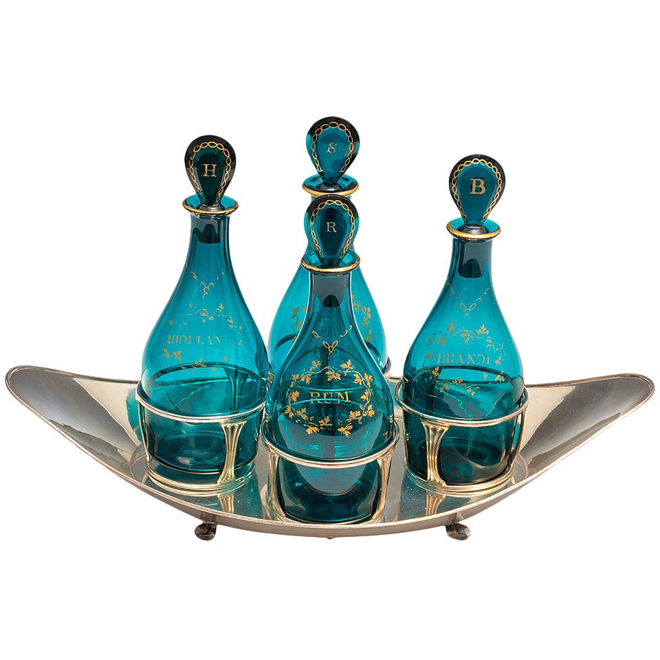 Fine Set of Green Georgian Decanters in a Silver Boat Shaped Stand For Sale