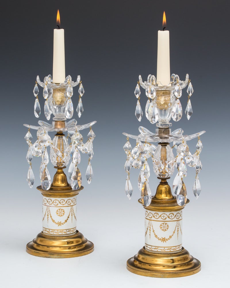 A Pair Of George III Porcelain Base Candlesticks