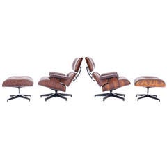 Virtually Mint Pair of Rosewood and Leather Eames Lounge Chairs and Ottomans