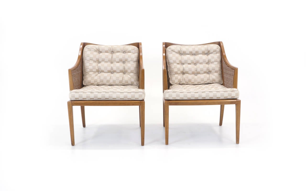 Elegant pair of Robsjohn-Gibbings armchairs.