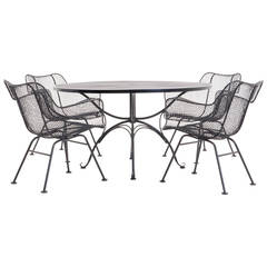 Russell Woodard Outdoor Dining Table with Four Sculptura Dining Chairs with Arms
