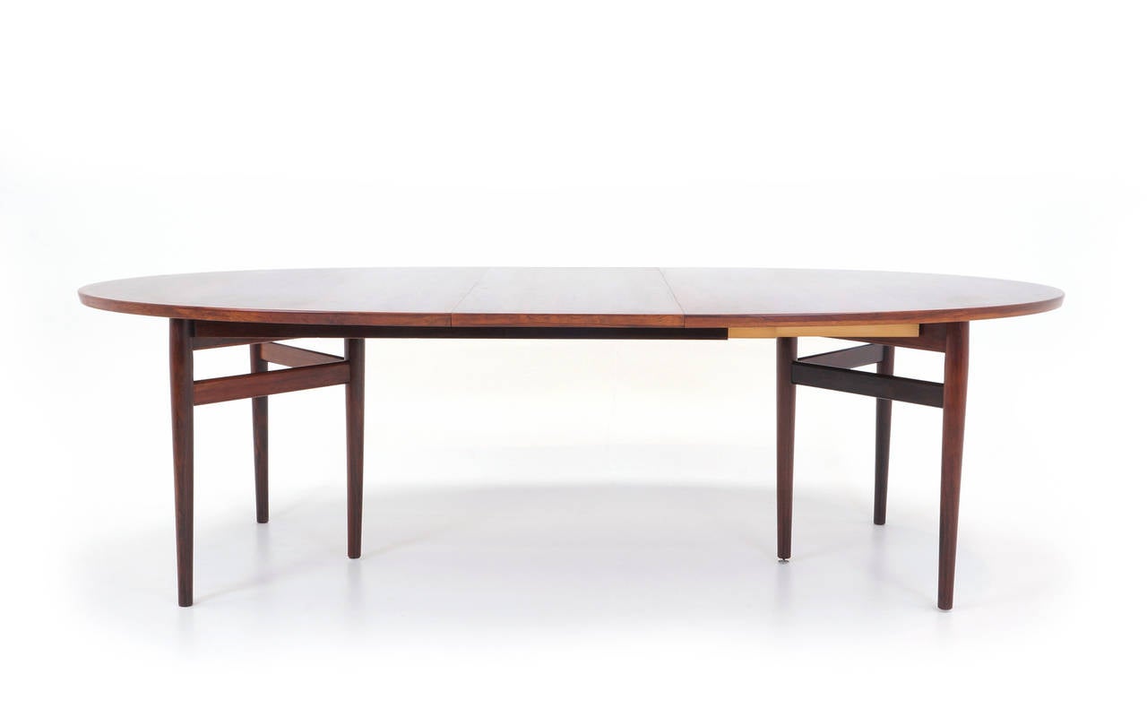 Beautiful, all original dining table of Brazilian rosewood designed by Arne Vodder.  All Brazilian rosewood is not created equal!  This table figuring in the wood grain on this table is stunning.  The table is 77.5