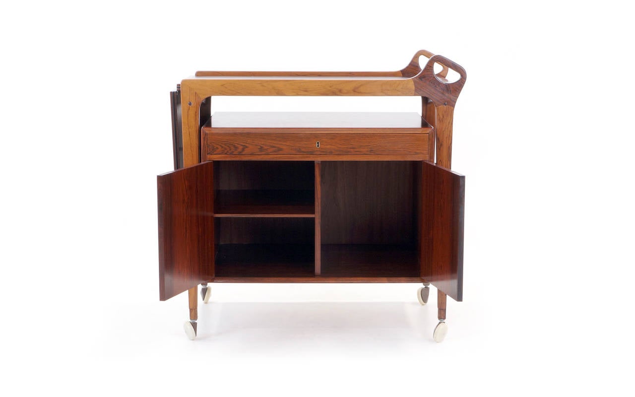 Mid-20th Century Danish Rosewood Bar Cart by Arne Vodder. Leather expandable drop leaf top.