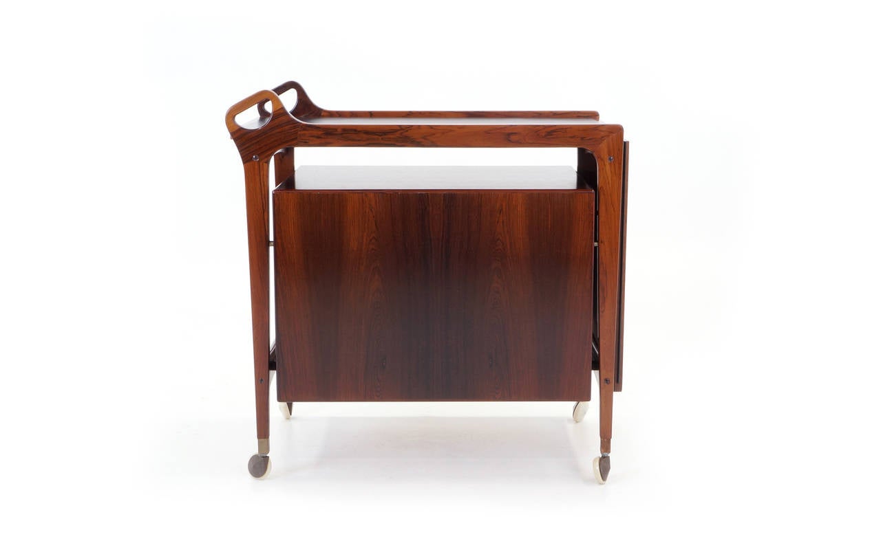 Danish Rosewood Bar Cart by Arne Vodder. Leather expandable drop leaf top. 1