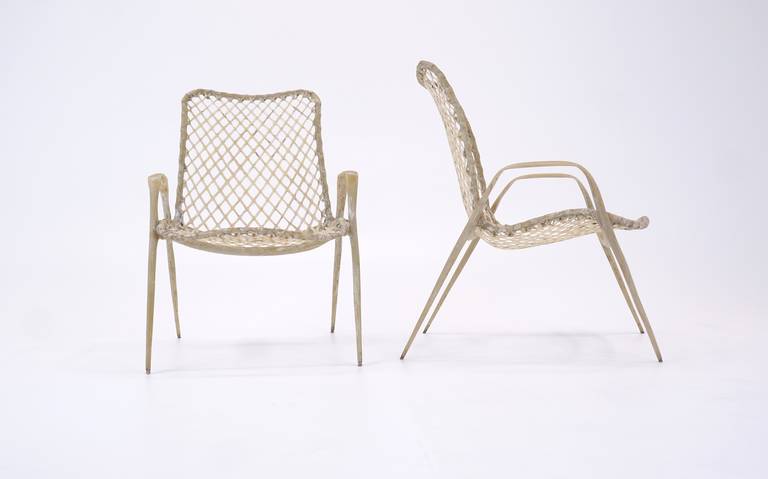 Sculptural resin string chairs by Troy Sunshade.  All original, no breaks.  These chairs are very comfortable.