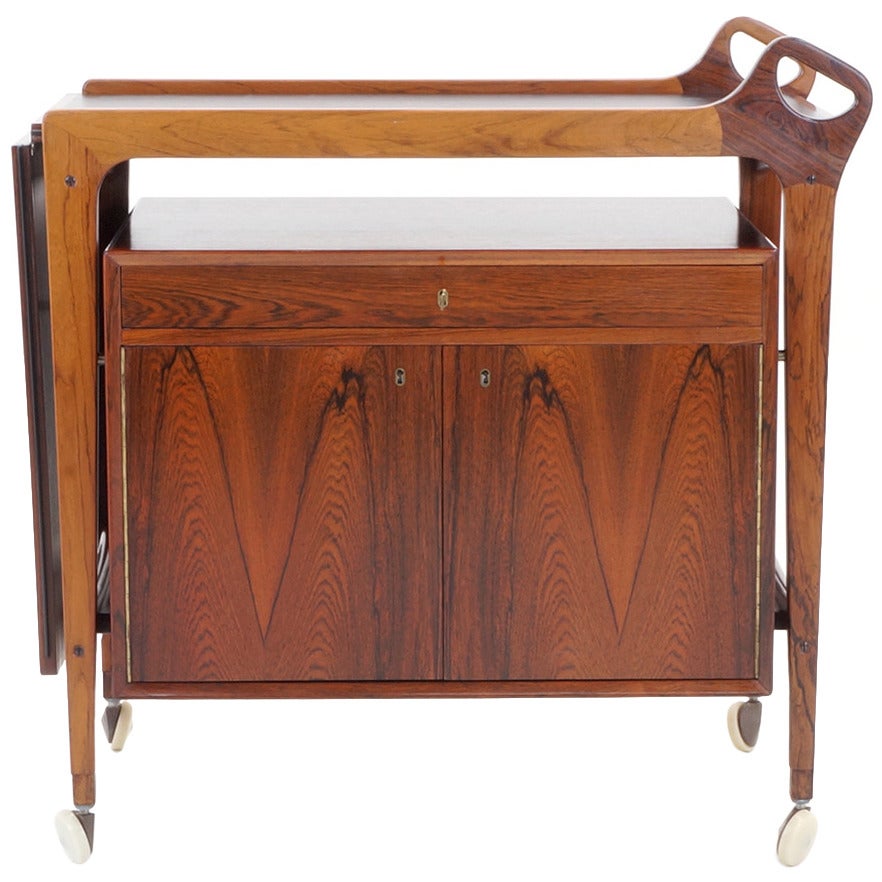 Danish Rosewood Bar Cart by Arne Vodder. Leather expandable drop leaf top.