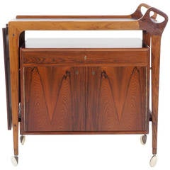 Vintage Danish Rosewood Bar Cart by Arne Vodder. Leather expandable drop leaf top.