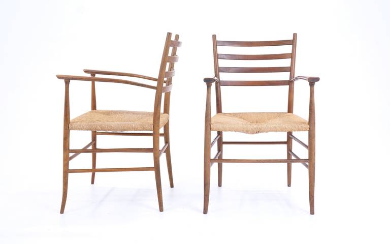 Subtle elegant designed pair of chairs marked 