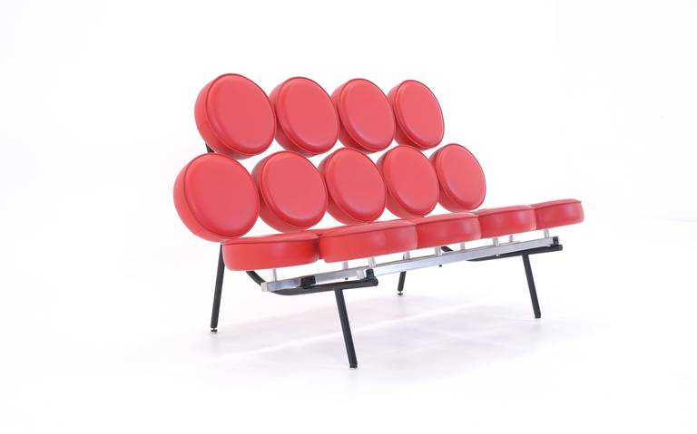 Early reissue of the iconic marshmallow sofa.  Original red leather in very good to excellent condition.  Designed by Irving Harper for the Nelson office,  