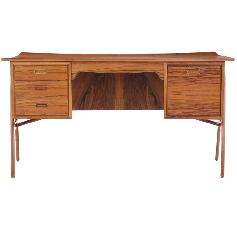 Stunning figuring in the Brazilian rosewood used for this sculptural Svend Madsen desk. An exceptional example of this design.