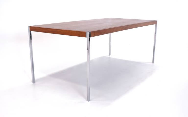 Richard Schultz dining table or table desk manufactured by Knoll.  Walnut with chromed steel legs and accents.