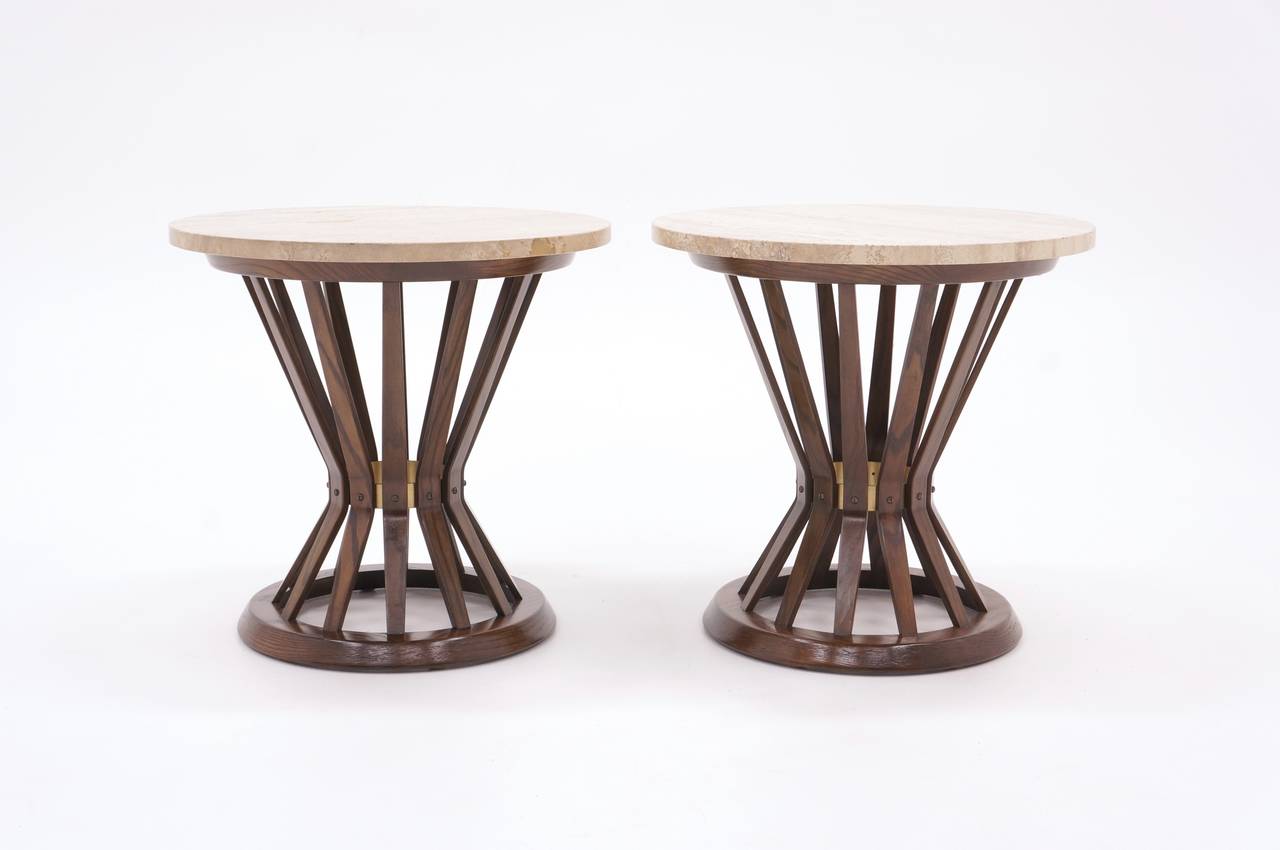 All original sheaf of wheat tables. Travertine tops, mahogany bases with excellent original finish and brass detail.