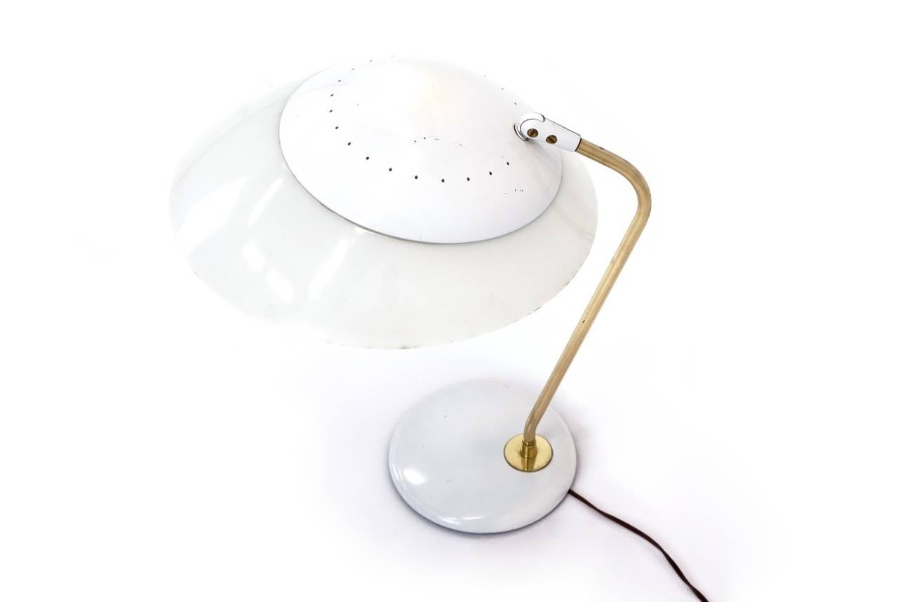 Gerald Thurston for Lightolier desk / table lamp. All original enameled aluminum shade and base with original diffuser and brass stem.  The diffuser is complete and in great condition.  The white painted elements have a few minute losses, no dents. 