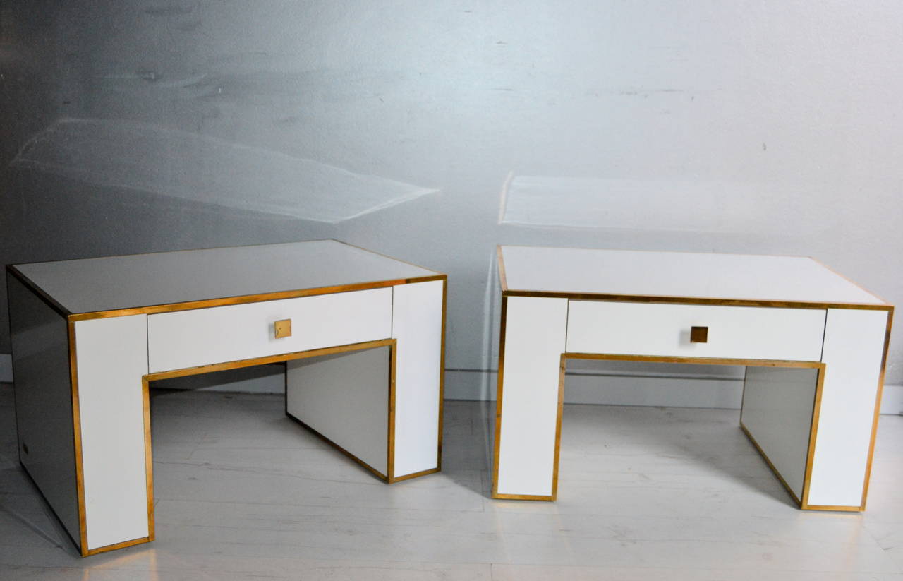 Paire of 1970s Nightstands or side tables in white formica with brass inlaid details.They have one drawer.
They are Signed on the side by The italian designer Alberto Rocchi .
Great vintage condition