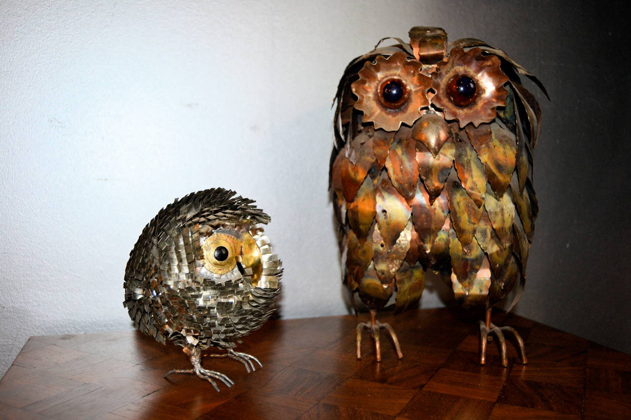 Two 1970s metal owls in the manner of Curtis Jere. The small one is in chrome and the other one in brass.
Small owl is :16cmx16cm