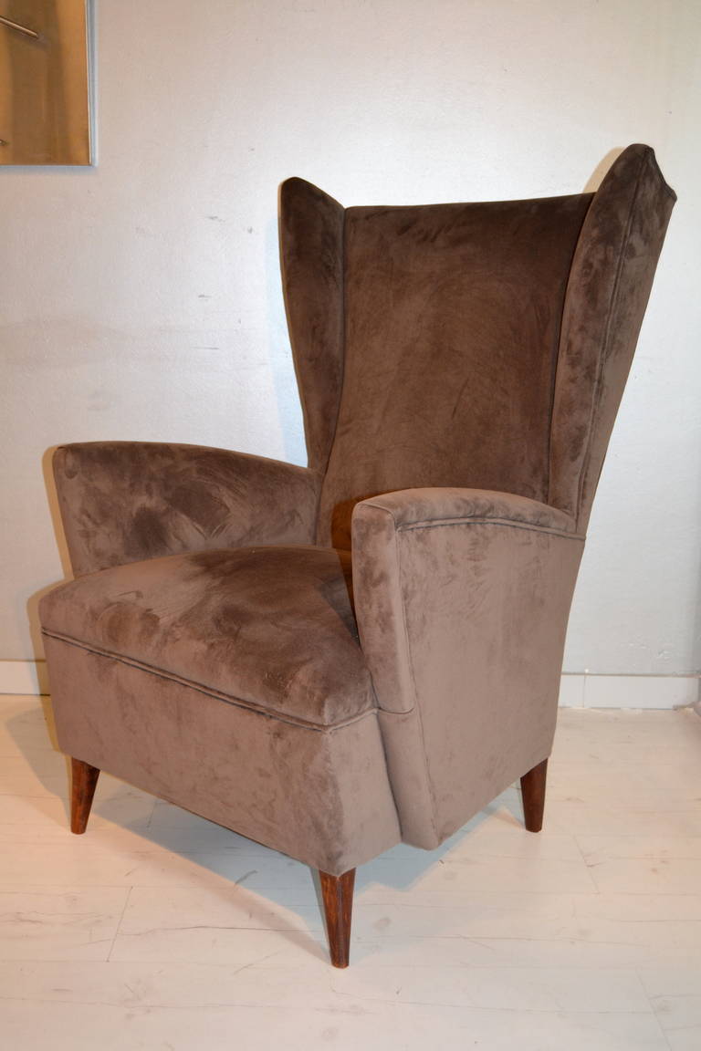 Pair of  1950s Italian high back armchairs upholstered in new velvet  in the manner of the Italian designer Paolo Buffa.
The color is grey taupe  and they are in perfect condition.