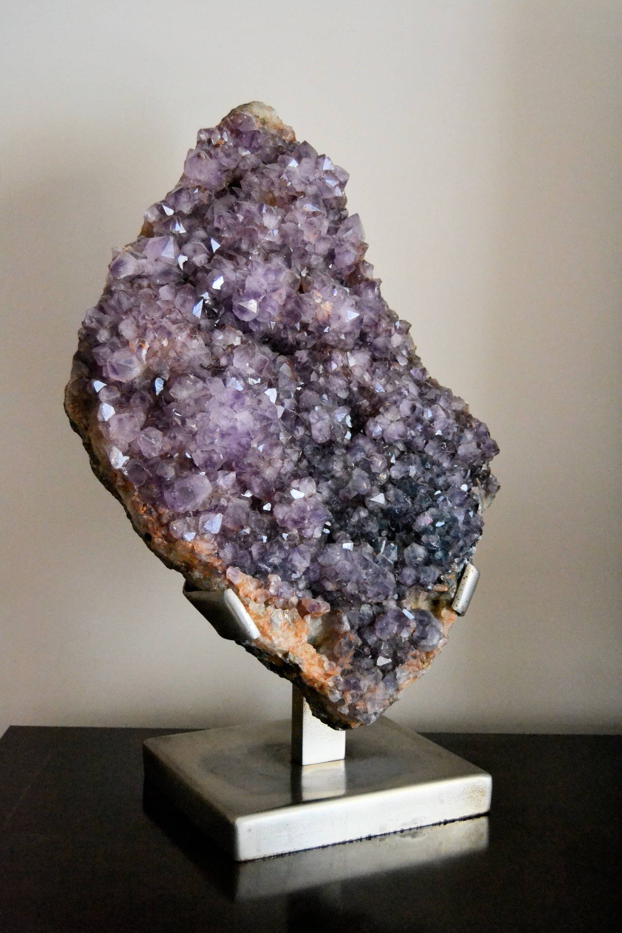 1970s Large amethyst mineral with stainless steel original  base.
The amethyst has the original base from the 1970s
