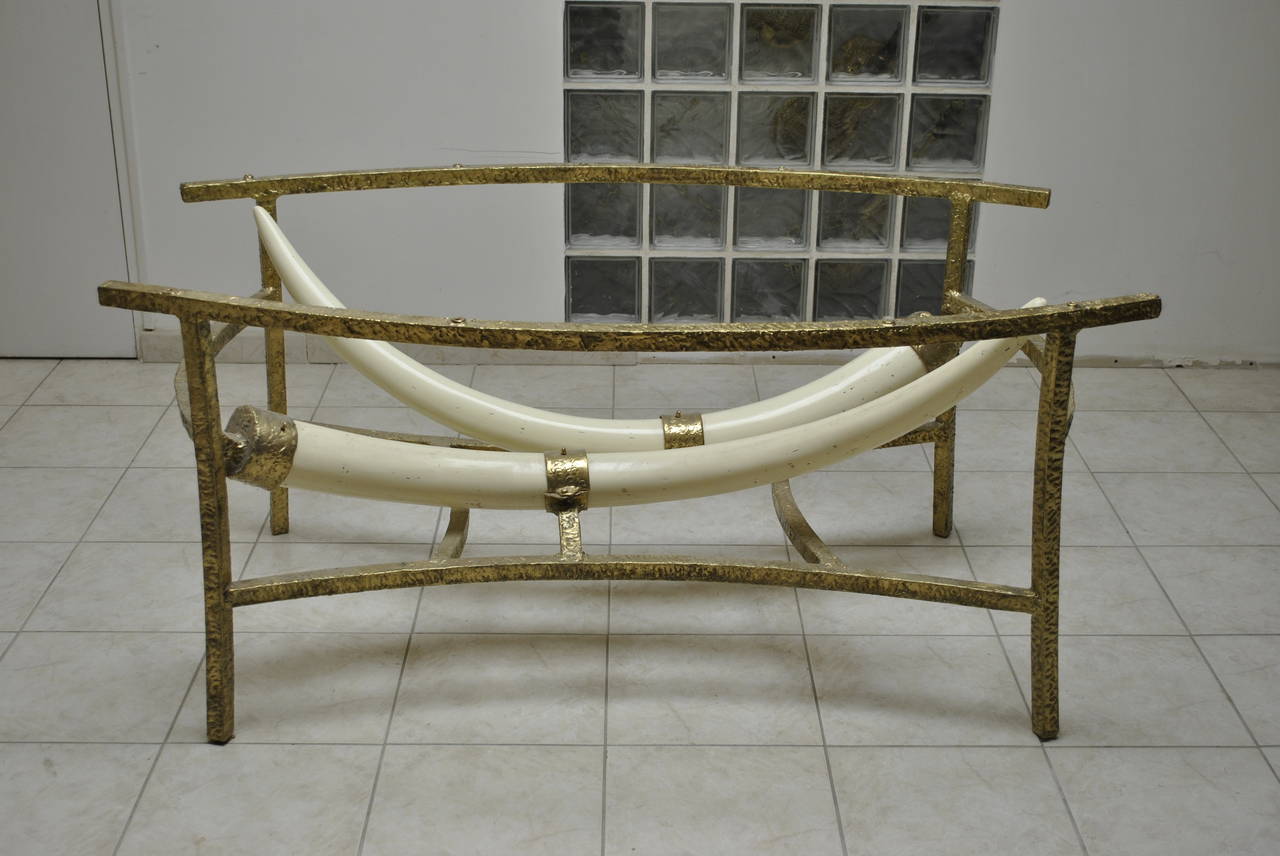 A spectacular and large dining table base by the French artist Henri Fernandez. Large resin elephant tusks mounted in a brass structure.
The base can easily support a glass top up to 280 cm long and can be used as a conference table.