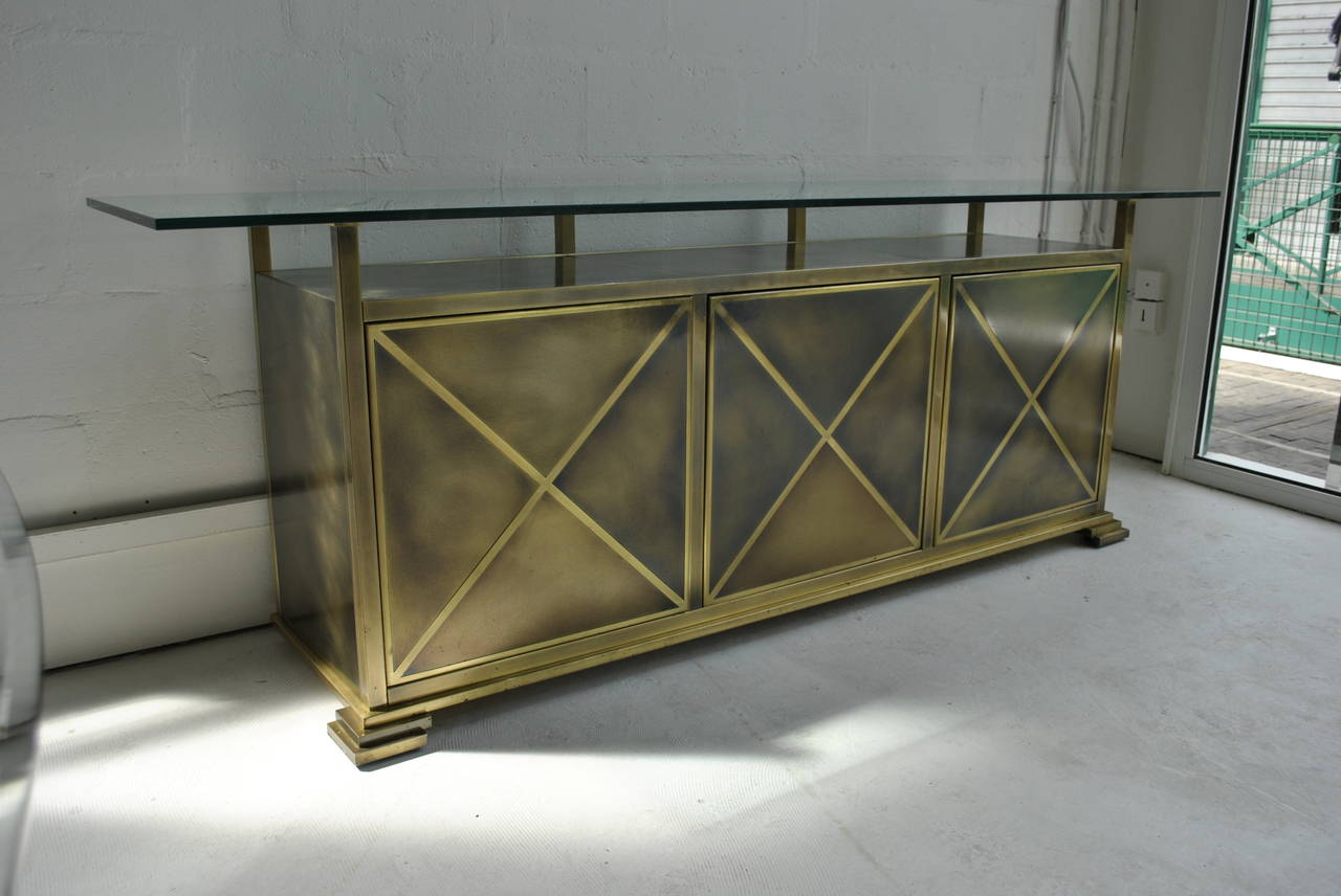 Spectacular bronze patinated steel and brass-plated sideboard by Belgo Chrome Dewulf Selection, Belgium, 1980s.
The dimensions given on the bottom are for the sideboard itself; it wears a thick glass top that measures 53 x 230cm.

We have the