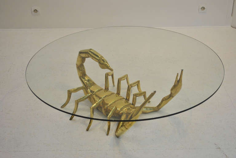 A nice and rare scorpion coffee table by Alain Chervet in polished brass, signed and dated: 