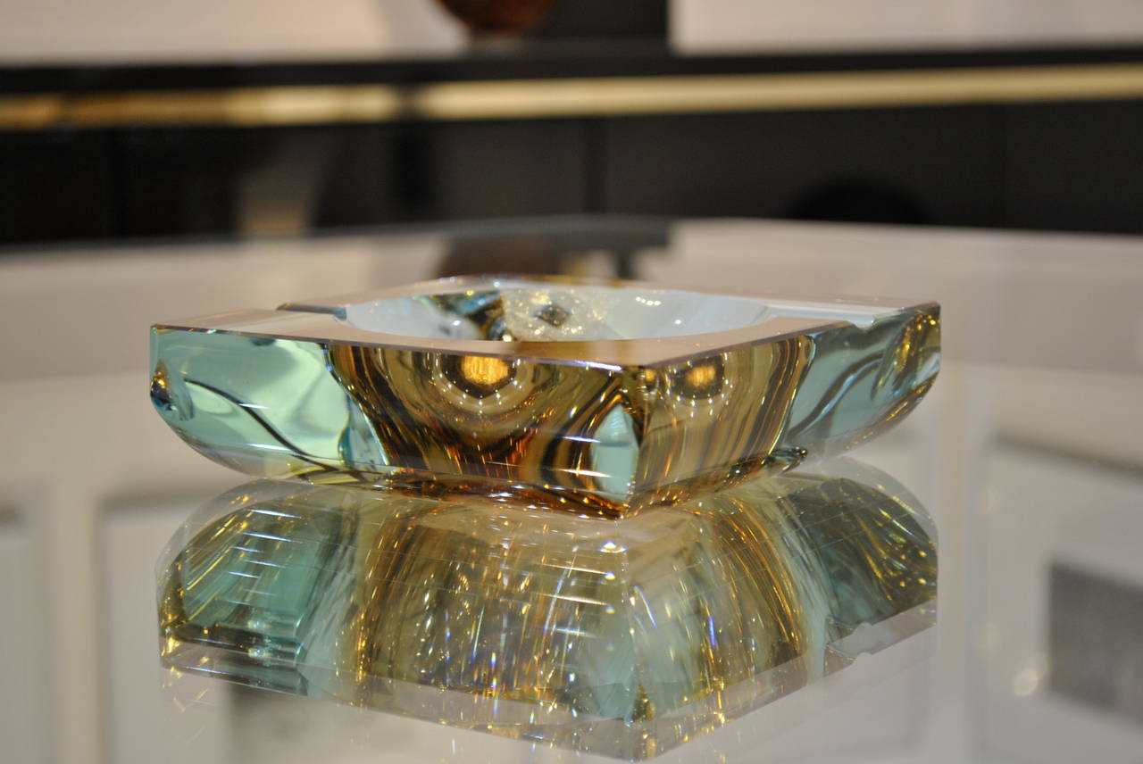 A very nice steel blue and amber couloured glass ashtray by Flavio Poli. Excellent condition.

FREE SHIPPING to Continental Europe, UK, Canada and USA is offered for this item if bought directly through 1Stdibs. (White glove for smaller pièces and