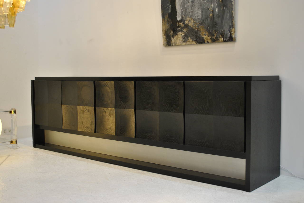This is one of the rarest pieces by the famous production of graphical and Brutalist credenzas in Belgium.
The sleak and sophisticated design matches all interiors.

We have the matching bar cabinet on sale in another listing.

FREE SHIPPING to